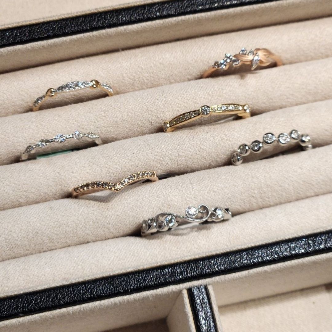 topaz and diamond necklaces displayed with white backdrop